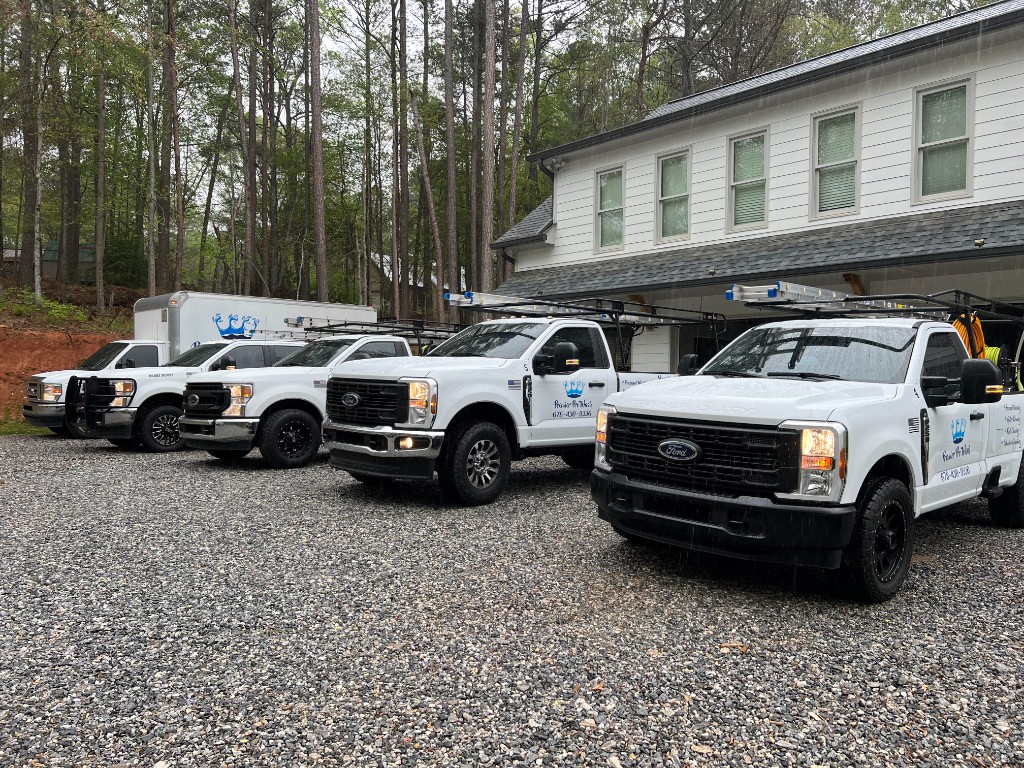 Premier Pro Wash fleet of service trucks ready for exterior cleaning jobs across North Georgia and Florida